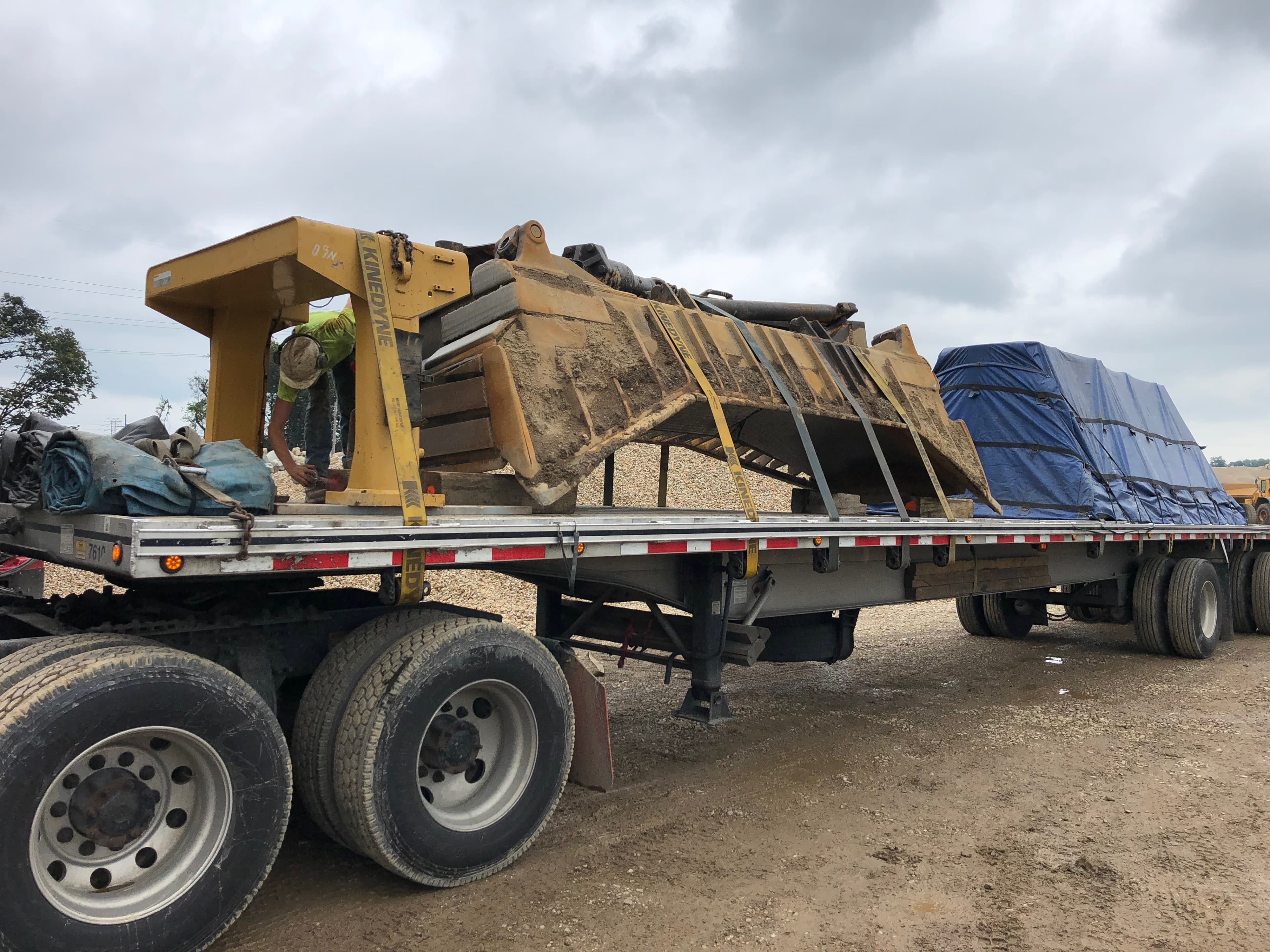 CAT D8 dozer blade prepared for transport
