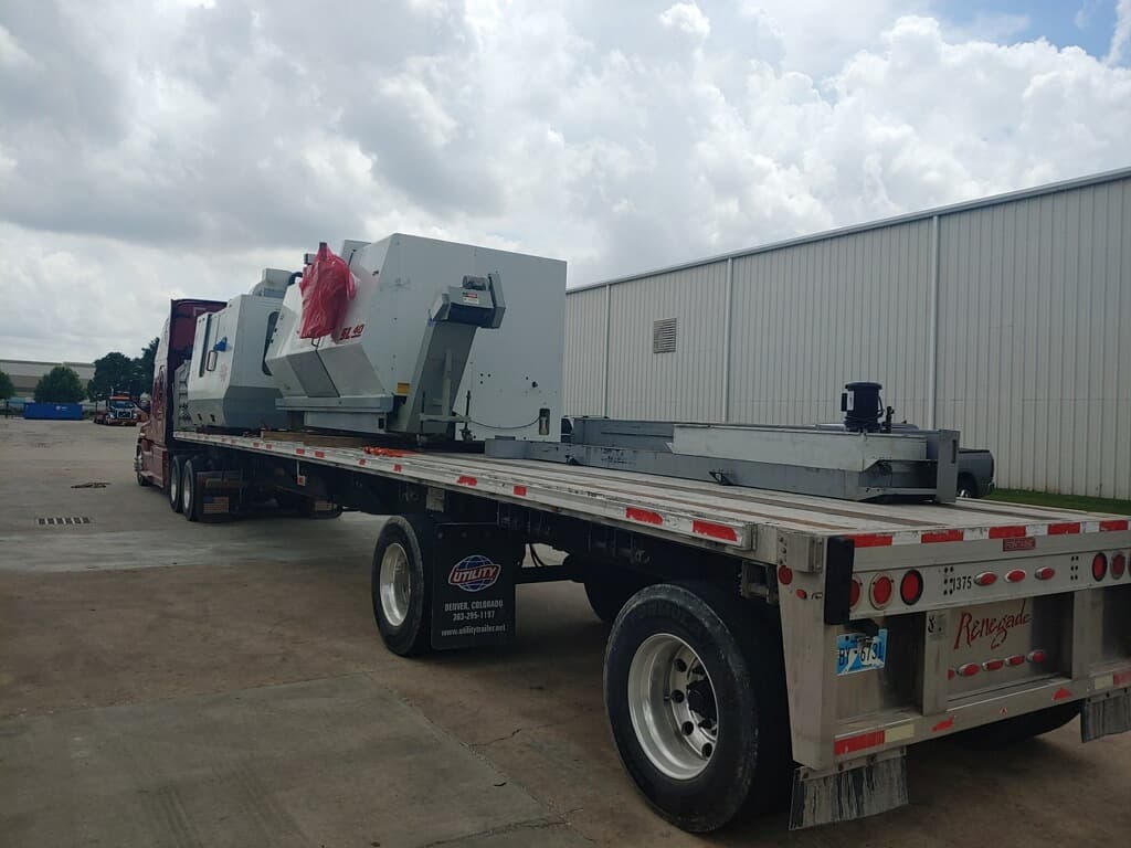 CNC machine loaded for transport