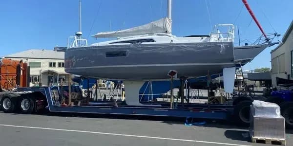 Boat loaded on a transport trailer for nationwide hauling
